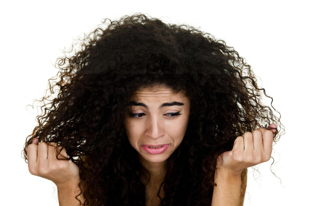 Causes of Frizzy Curly Hair in Summer & How to Combat It